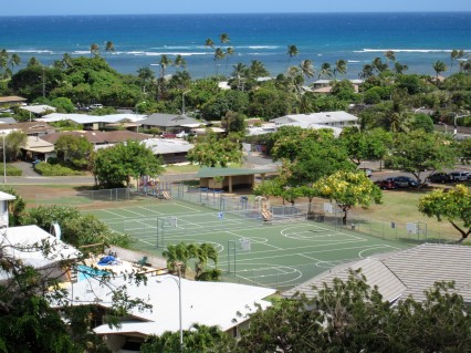 View of basketball courts and a playground